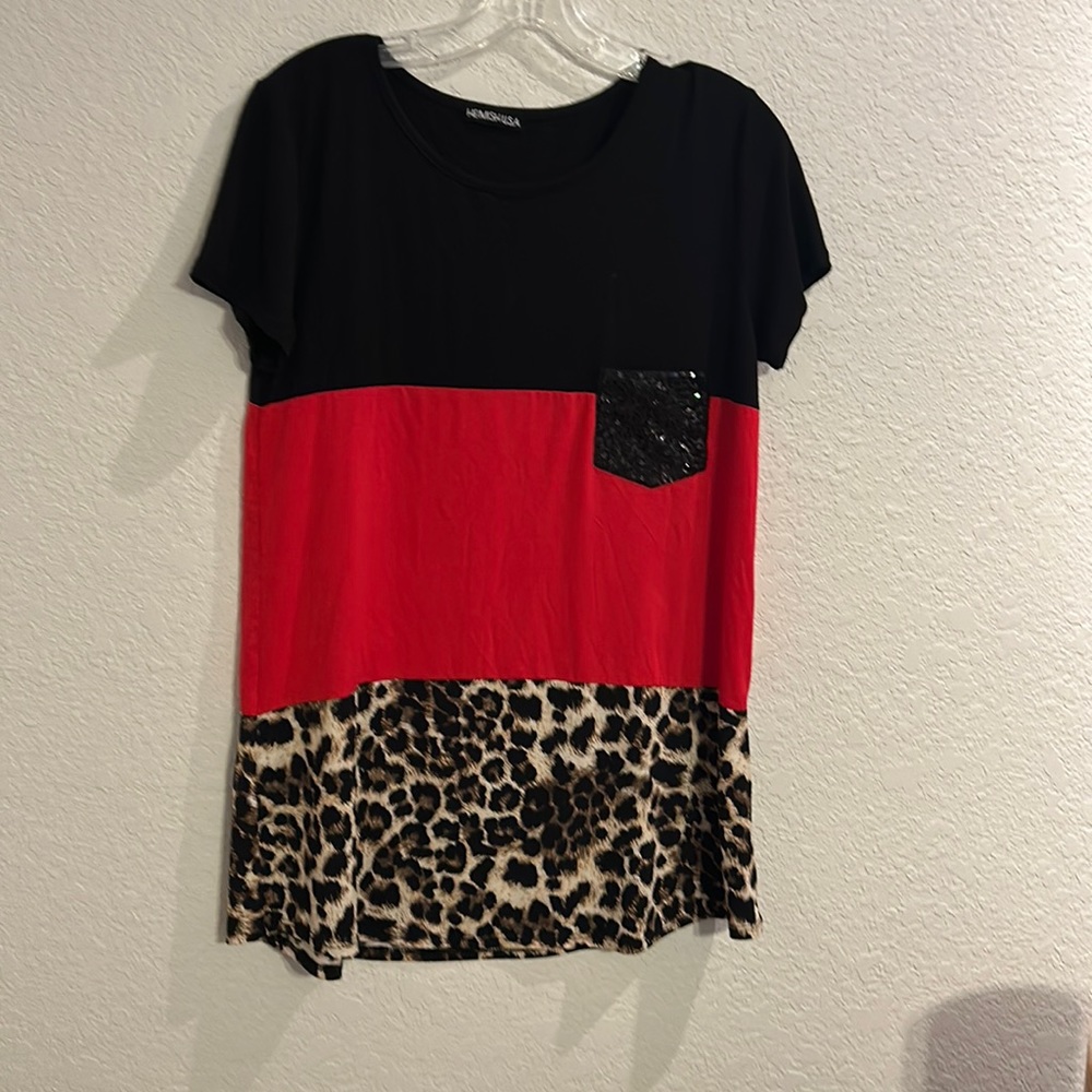 Cute red, black and Leopard blouse.  Has sparkle pocket.  Very soft.